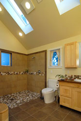 Bathrooms: Walk-in shower with little or no threshold and ample floor space for maneuvering.